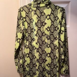 Turtleneck neon and black body con dress